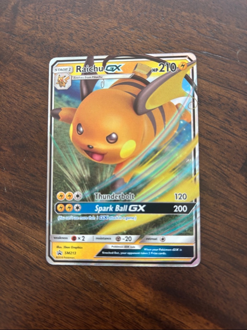 Pokemon Raichu GX Yellow Orange Holographic Trading Card